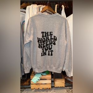 “The world needs you in it” sweatshirt